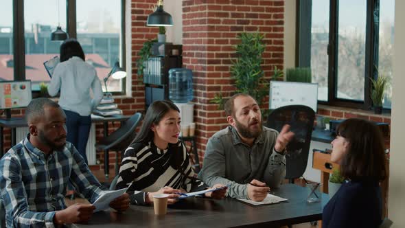 Female Applicant Attending Job Interview Meeting with Employees