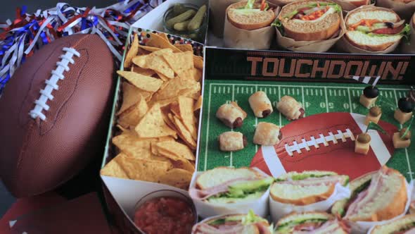 Football Snack Stadium filled with sub sandwiches, veggies and chips.