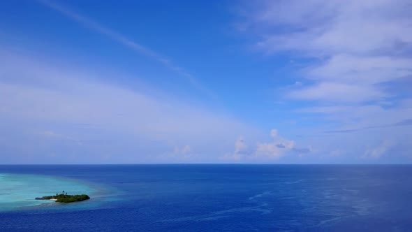 Aerial drone landscape of resort beach voyage by blue sea and sand background