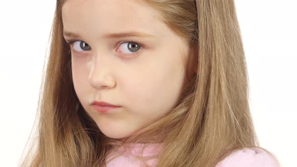 Child Sighs Heavily, She Is Tired. White Background. Close Up