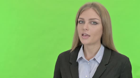 Ambitious Businesswoman Giving Presentation Against Chroma Key