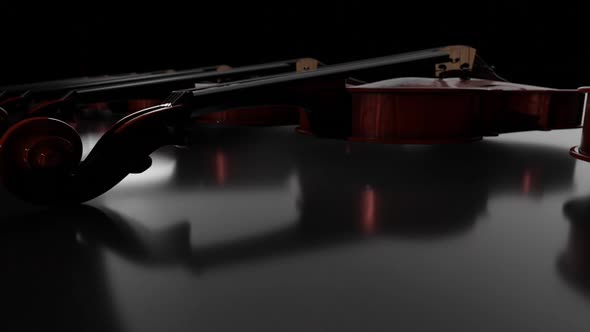 Violins in Dark Room Video for Store or Workshop