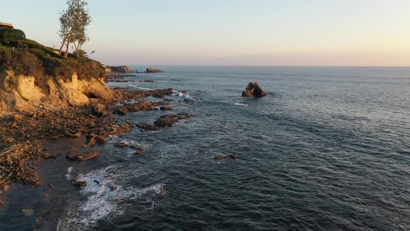 Flying over the beautiful Laguna Beach tide pools at Sunset in California.