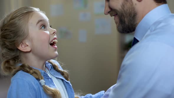 Excited Girl Hugging Father, Family Relationship, Unconditional Parent Love