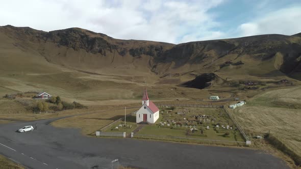 Aerial Dolly Shot Flying Towards a Unique Icelandic Church.