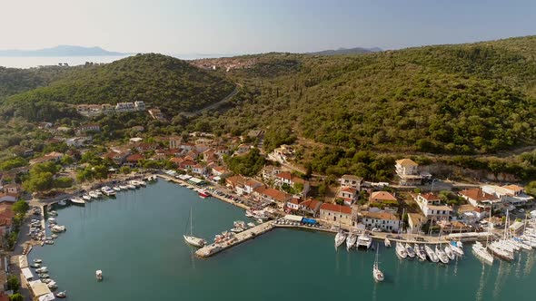 Aerial view above of harbor on the coast of mediterranean sea, Greece.