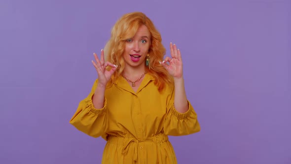 Redhead Girl Looking Approvingly at Camera Showing Ok Gesture Like Sign Positive Something Good