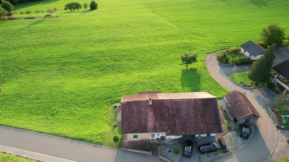 Aerial Landscape View of Ideal Green Fields in Liechtenstein Alps at Sunset