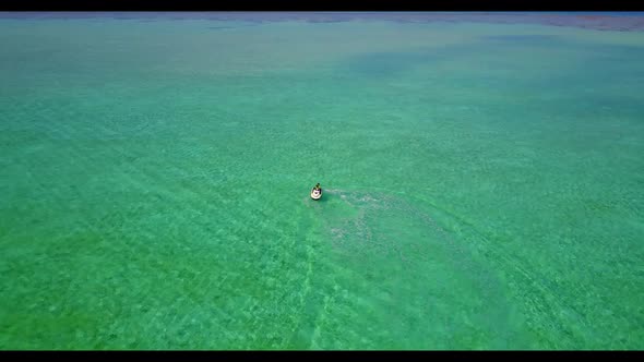 Aerial top view sky of perfect shore beach journey by blue sea and white sand background of a dayout