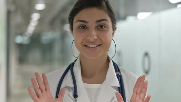 Portrait of Beautiful Indian Female Doctor Doing Video Chat