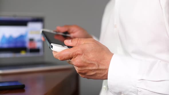 Businessman Playing Video Game Console