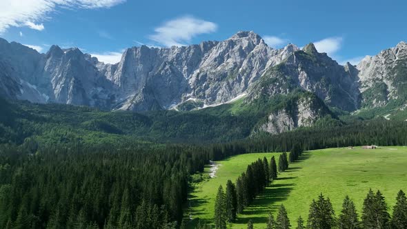 Emerald lake at Fusine with Mangart mountain