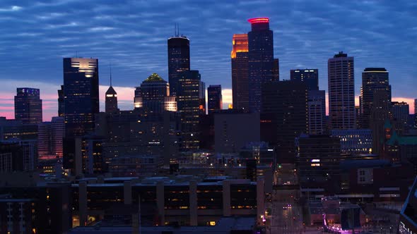 Aerial, skyscrapers of downtown Minneapolis skyline in the evening, overcast day