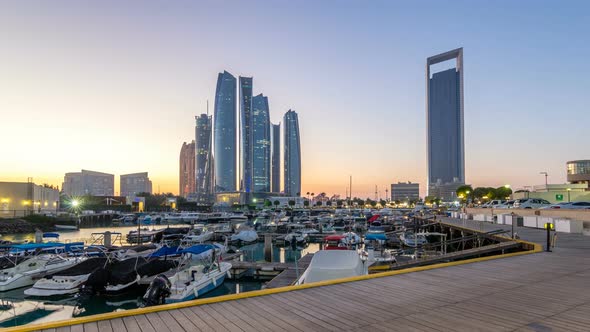 Al Bateen Marina Abu Dhabi Day to Night Timelapse with Modern Skyscrapers on Background