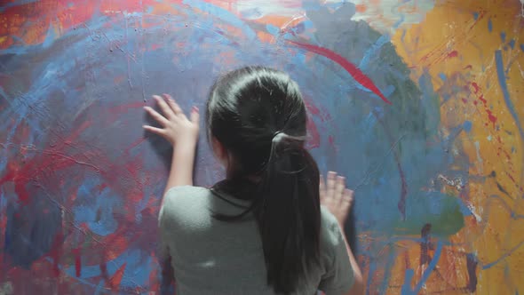 Talented Innovative Girl Draws With His Hands On The Large Canvas, Using Fingers He Creates Colorful