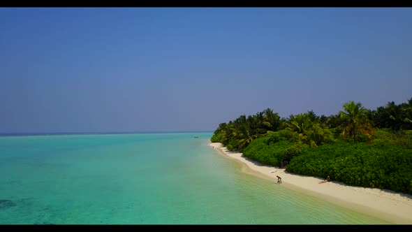 Aerial top view sky of perfect seashore beach adventure by turquoise water with white sandy backgrou