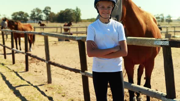 Portrait of girl standing with arms crossed in ranch 4k