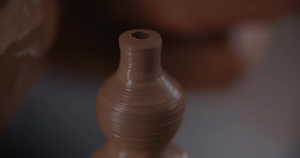 Potter Sculpts a Tiny Ceramic Jug in Slow Motion on a Potter's Wheel Small Forms in Pottery Potter