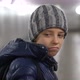 Portrait of Alone Sad Boy in Hat and Jacket in Underground Covered Walkway in City at Winter - VideoHive Item for Sale