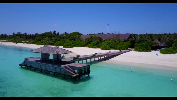 Aerial top view travel of tranquil island beach time by transparent water and white sandy background