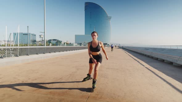 Female on Roller Blades Using Smart Watch