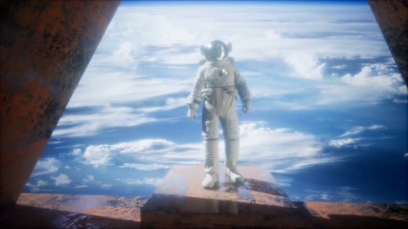 Astronaut on the Space Observatory Station Near Earth alt