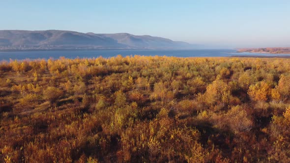 Aerial view of the Zhiguli mountains and the islands of the Volga river in the autumn season.