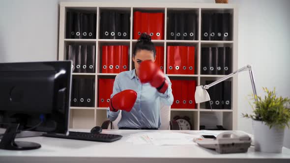 Young Businesswoman in Boxing Concept