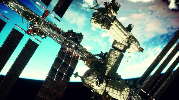 International Space Station Over the Planet Elements Furnished By NASA alt