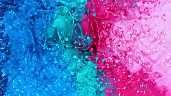 Super Slow Motion Shot of Abstract Splashing Colors at 1000 Fps, Top Shot.