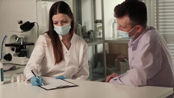 Female Hands Doctor Nurse in Latex Gloves Hold Syringe with Medicine Vaccine