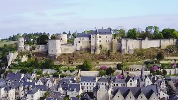 Panning clip of the mediaeval village and Chateau of Chinon overlooking the Vienne River
