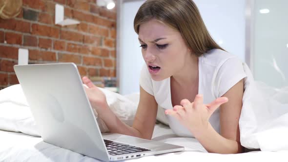 Angry Frustrated Woman Yelling While Working on Laptop