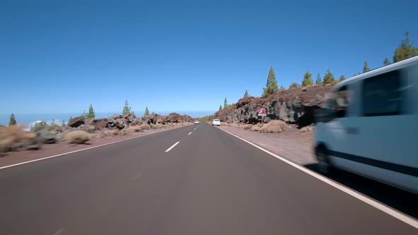 Driving a car with attached action cam in Teide National Park Tenerife