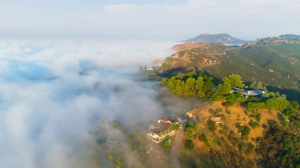 Scenic Aerial Nature Shot with Beautiful Clouds in the Golden Light of Sunrise