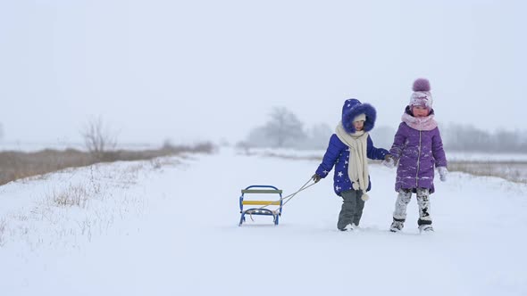 Cute kids having fun at winter holidays.