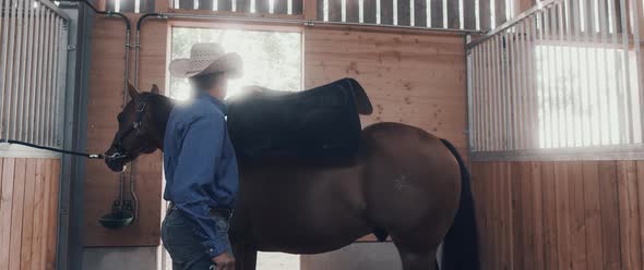 Cowboy on a Horse Ranch