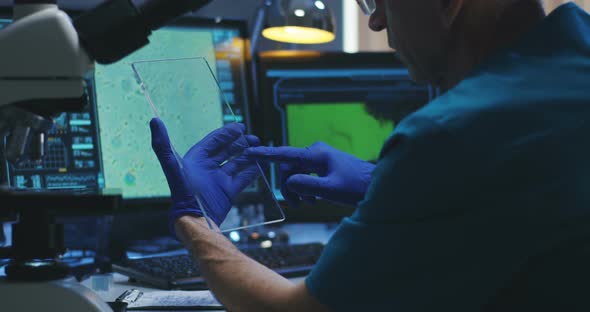 Scientist Using Transparent Display Screen