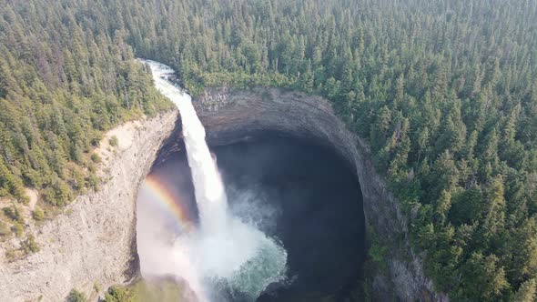 Large and impressive Helmcken Fallsand a rainbow on the Murtle River in British Columbia, Canada. Wi