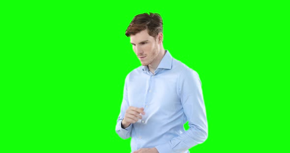 Caucasian man on green background