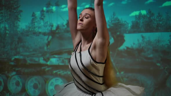 Portrait of Confident Young Ballet Dancer Performing at Background of Destroyed Tank Picture