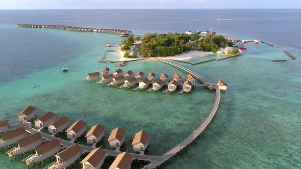 Aerial view of amazing bungalow resort, Maldives island.