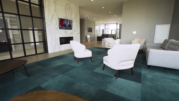 Modern European condo's lounge area and lobby.