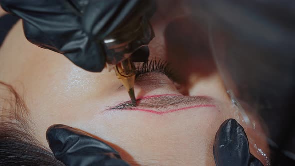 Master Beautician Does Eyebrow Tattoo