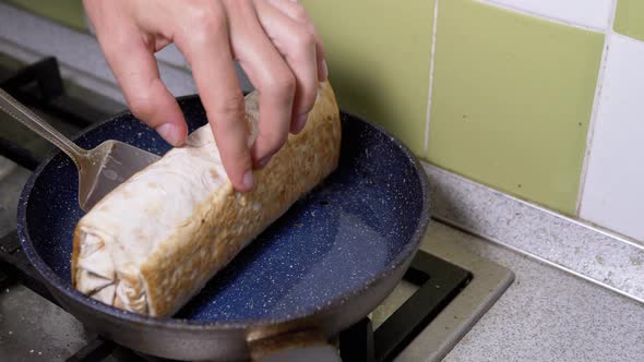 Cooking Meat Shawarma in a Hot Pan Until Crisp