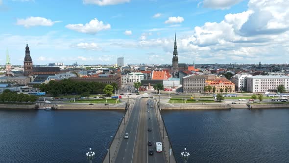 Beautiful Sunny Day with Clouds Going Over the Center of the City