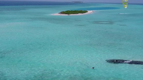 Aerial view scenery of marine resort beach by clear ocean with sand background