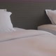 beautiful casual white soft pillow and bed sheet bedroom - VideoHive Item for Sale
