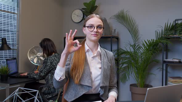 Cheerful Female Girl Manager Showing Ok Approval Gesture Satisfied with Good Results of Work
