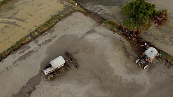 Aerial view tractors plow